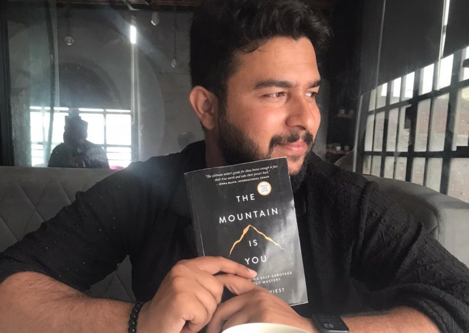 Ali Ahmad reading