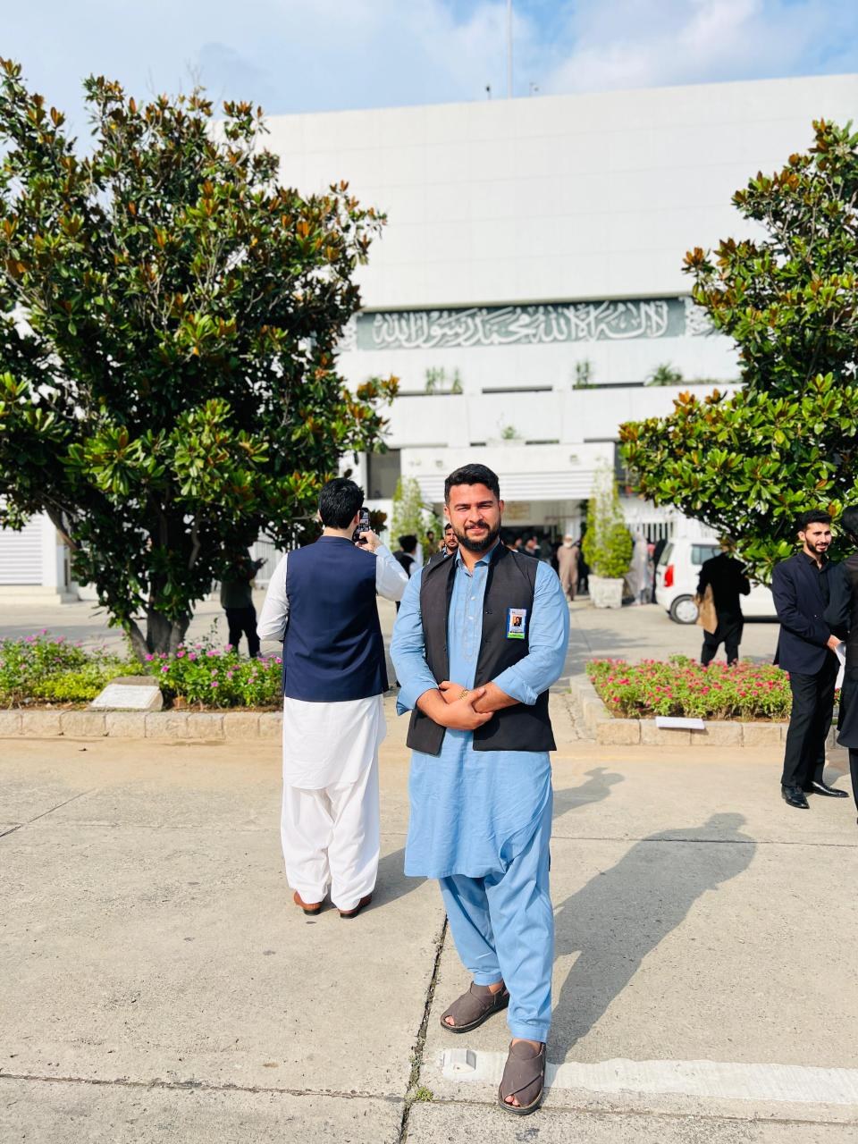 Standing in front of Parliament of Pakistan